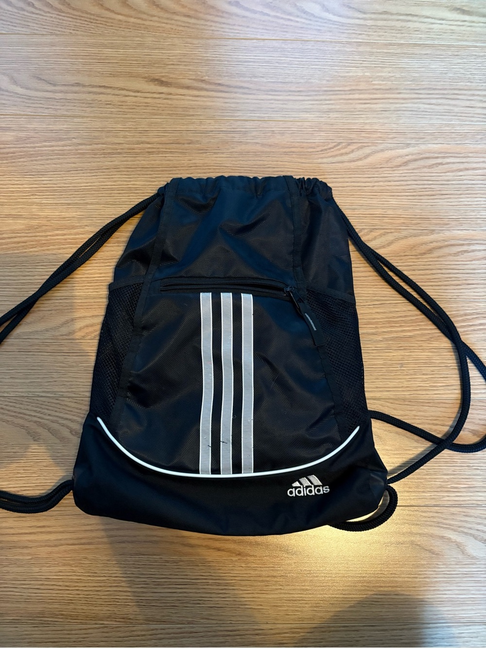 adidas Black Drawstring Backpack with White Stripe Accents